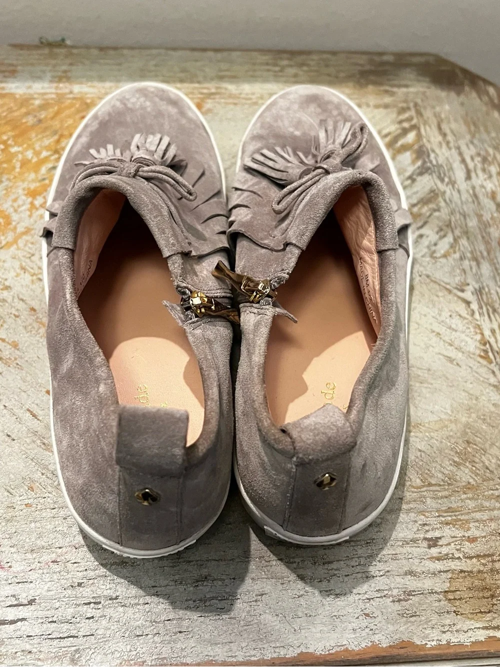 Kate Spade Taupe Gray Suede Fringed Tassel Slip-On Sneakers Gold Tone Side Zip
